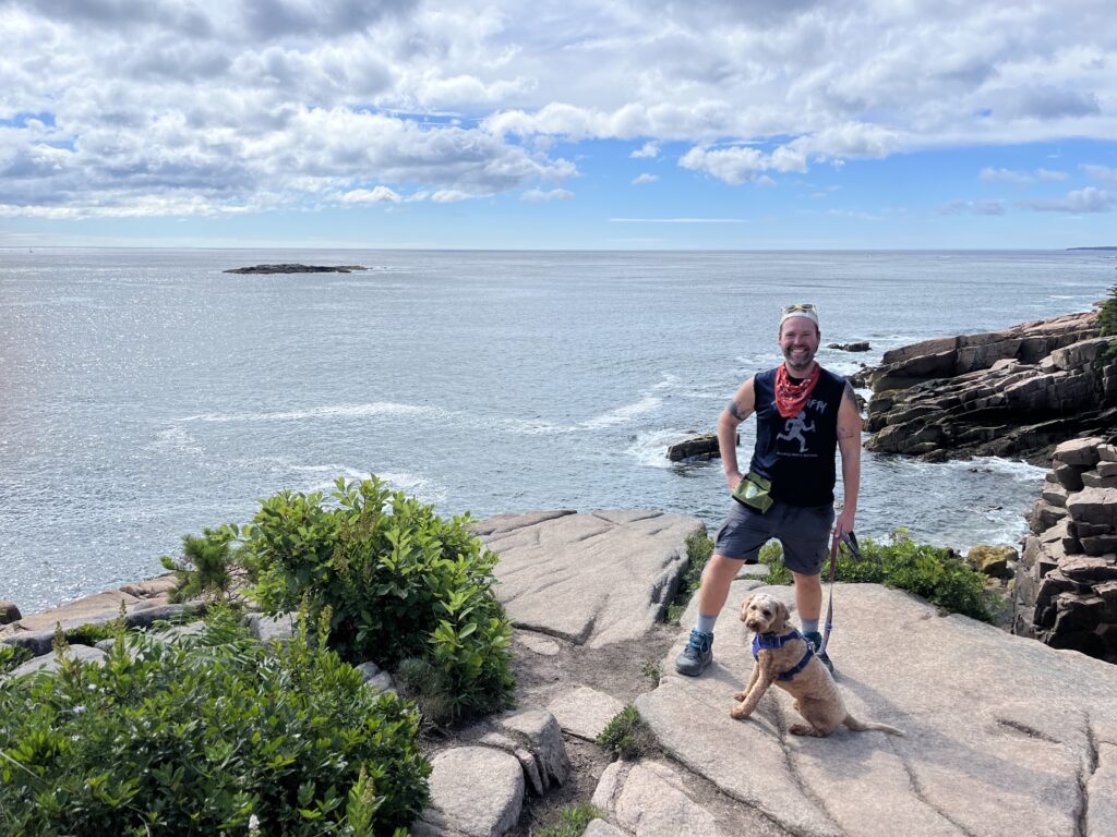 Hiking in Acadia National Park with your dog is dreamy with these views of the Atlantic Ocean.