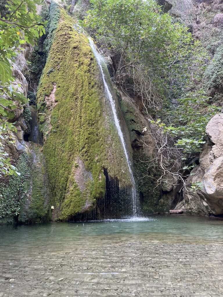 Waterfall stop during the Richtis Gorge Day Hike in Crete Greece.