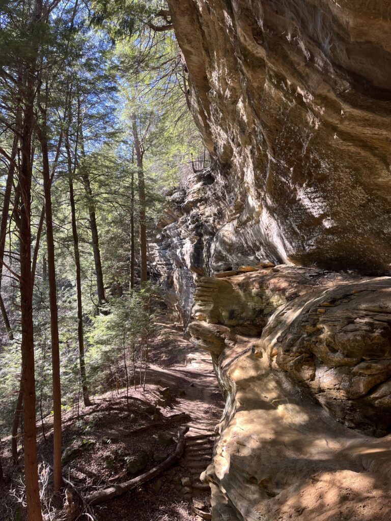 Hiking along the Buckeye Trail to Cedar Falls from Old Man's Cave in Hocking Hills Ohio.